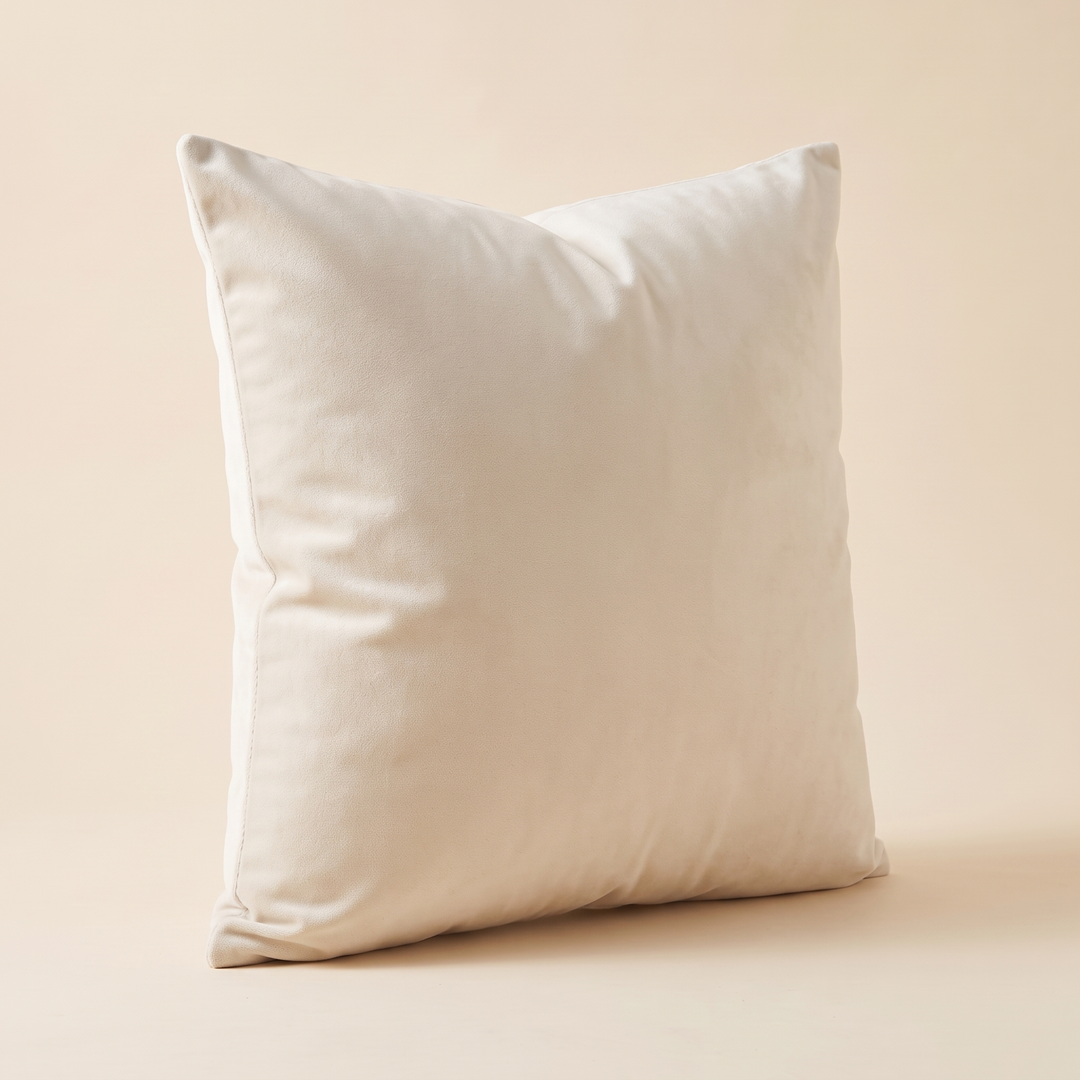 Velvet Pillow Cover in Cream – turned at a three-quarter angle showing the side seam