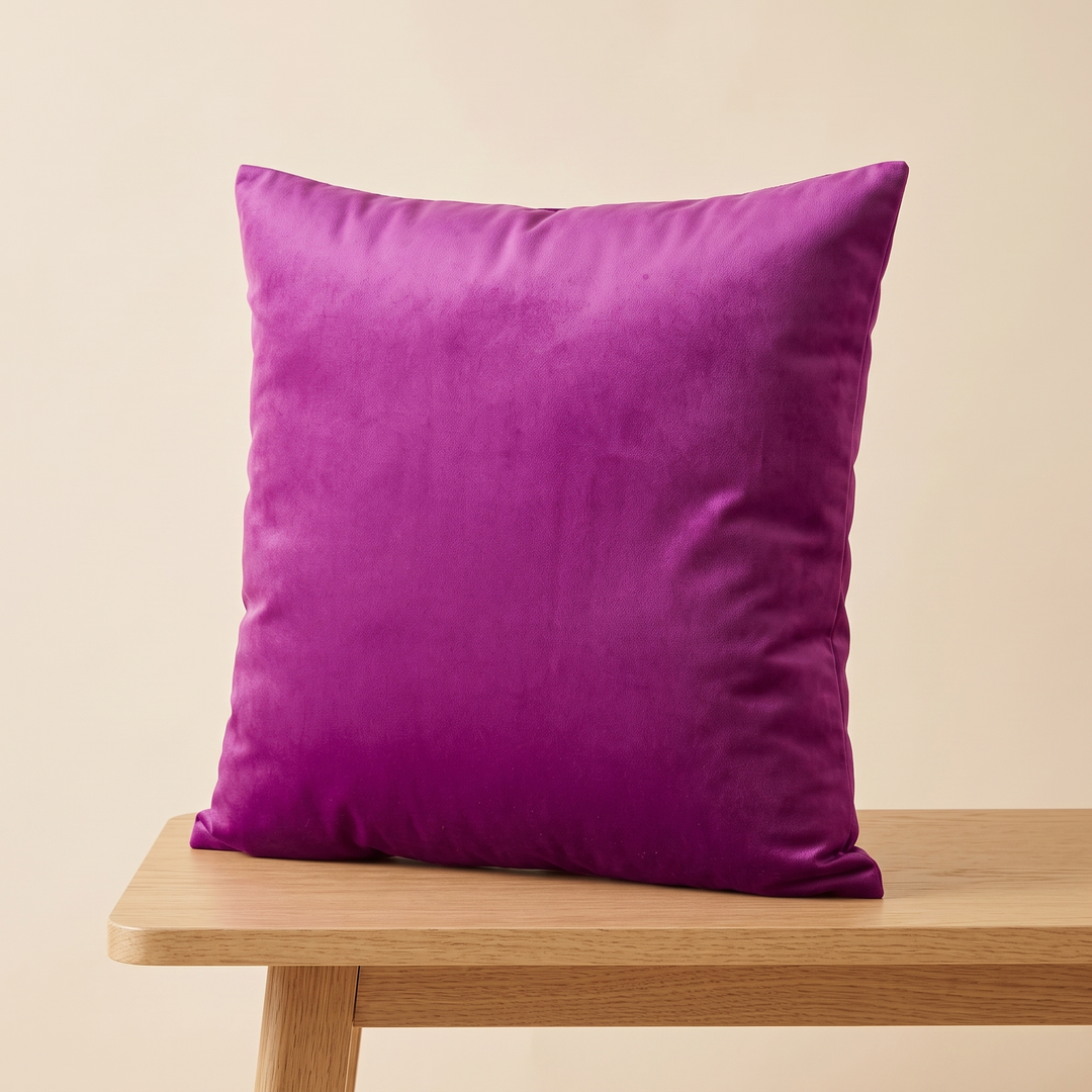 Velvet Pillow Cover in Violet – on a wooden bench edge with tapered leg visible