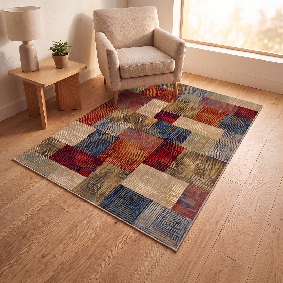 Vintage Patchwork Rug – Washable in Multicolor – laid on a wood floor beside an armchair and side table