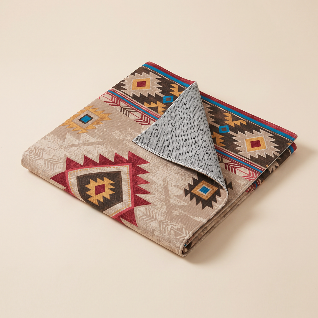 Washable Kilim-Style Rug in Beige Kilim – folded neatly on a plain cream background, one corner flipped up