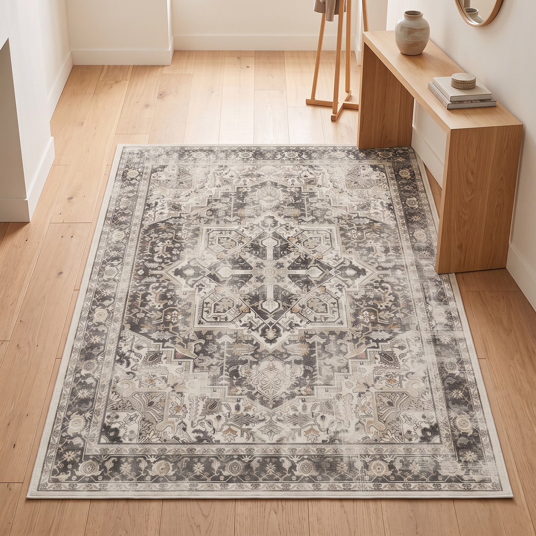 Washable Vintage Persian-Style Rug in Taupe Medallion – overhead view in a hallway beside a wooden console table