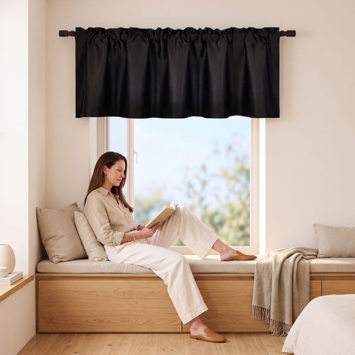 Window Valance – Rod Pocket Top in Black – above a window seat where a woman reads a book