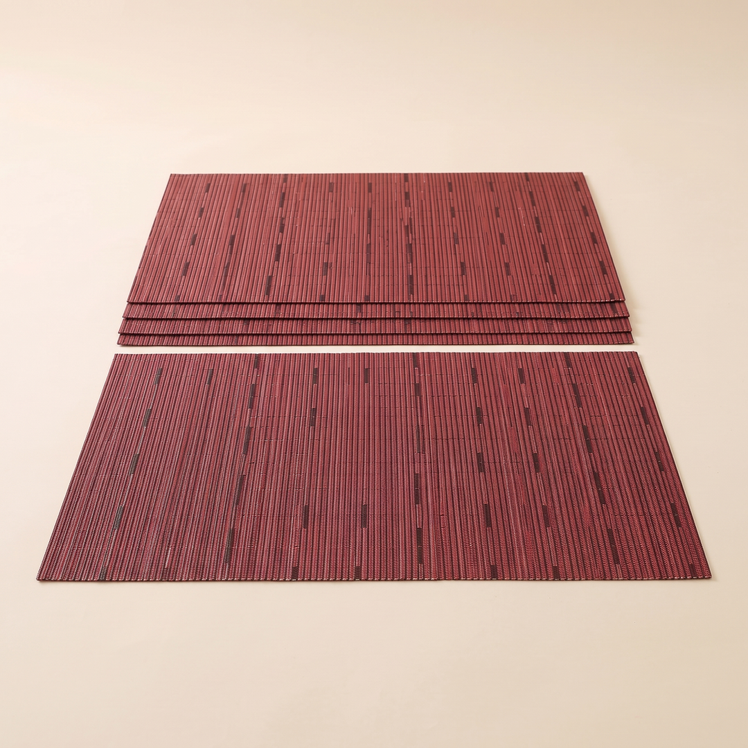 Woven Placemats – Wipe Clean in Wine Red – Dash Weave – neat stack of four behind a single mat laid flat
