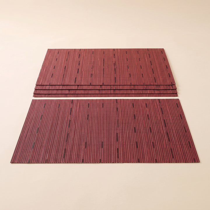 Woven Placemats – Wipe Clean in Wine Red – Dash Weave – neat stack of four behind a single mat laid flat